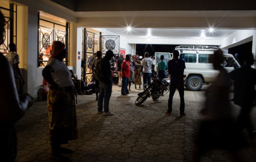 Patients arrive outside the emergency department at University Hospital in Mirebalais, Haiti. 