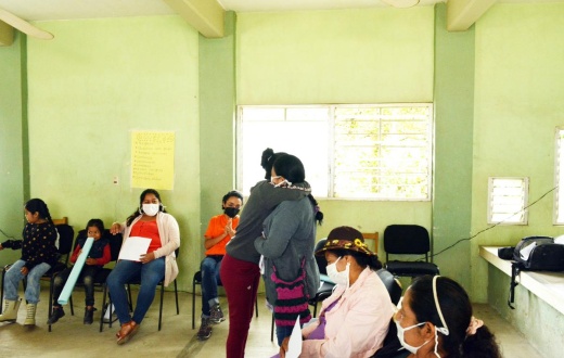 Women embrace at one of the women's circles hosted by Compañeros En Salud, as Partners In Health is known in Mexico, in the community of Matazano. 