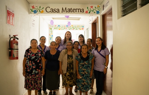Partners In Health staff stand with traditional midwives in the new Casa Materna, opened by PIH and the Ministry of Health. The PIH staff include Mariana Montaño, Fernanda Baroja, Azucena Espinoza, Cristina Torres and Ameyalli Juárez.