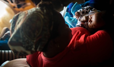 Mathabo Lerata* holds her infant son, Thabo*, at their home in Mohale's Hoek, Lesotho, in February 2018. Mathabo Lerata* holds her infant son, Thabo*, at their home in Mohale's Hoek, Lesotho, in February 2018.