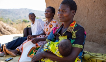 Agnes Paulo with her son Ulemu at their home in Neno District, Malawi