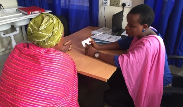 Alphonsine Imanishimwe, coordinator of the 2017 hepatitis C trial in Rwanda, counsels a new patient