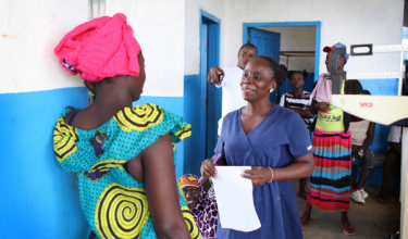 Midwife in Liberia checks in with maternal health patient