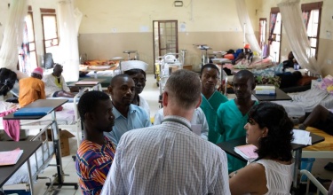 Dr. Farmer with medical staff and residens