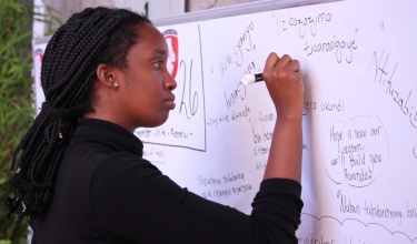 UGHE Orietta Agasaro writes a message of hope to genocide survivors