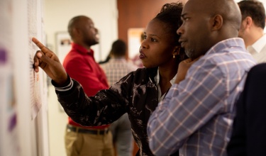 lab poster session at PIH Boston office