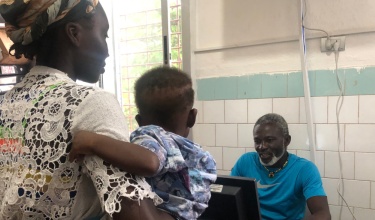 Outpatient check-in at J.J. Dossen Hospital in Liberia