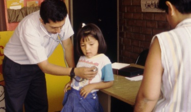 Dr. Jaime Bayona, doctor and founder of Socios En Salud in Peru, provides medical care in the neighborhood of Cristo Luz del Mundo in Carabayllo.