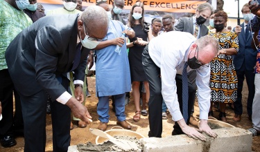Dr. Austin Demby, Sierra Leone’s minister of health, and Dr. Paul Farmer, PIH co-founder