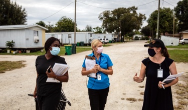 community health workers provide COVID-19 info door to door in Immokalee, Florida