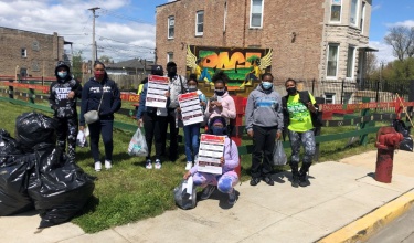 The Chicago-based Antioch Community Social Service Agency youth outreach team going door-to-door in the Englewood neighborhood with COVID-19 vaccine information.