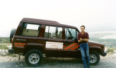 Dr. Paul Farmer with one of the first ambulances used in Cange, Haiti