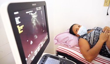 Carmen Ramos Quiroz, patient at Casa Materna, in Mexico, at an ultrasound appointment in October 2021. Compañeros En Salud, as Partners In Health is known locally, has worked there for more than a decade in partnership with the Ministry of Health, providing medical care and social support to thousands of families.