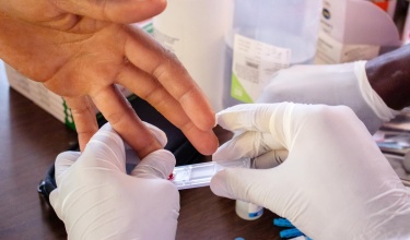 A patient receives a screening for hepatitis in Kayonza, one of the three districts in Rwanda supported by Partners In Health. 