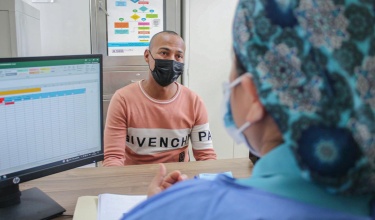 Cruz Antonio Sifuentes attends an appointment for HIV care through support from Socios En Salud, as Partners In Health is known in Peru.