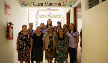 Partners In Health staff stand with traditional midwives in the new Casa Materna, opened by PIH and the Ministry of Health. The PIH staff include Mariana Montaño, Fernanda Baroja, Azucena Espinoza, Cristina Torres and Ameyalli Juárez.