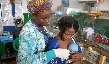 Linda Depoyou holding baby Godsent