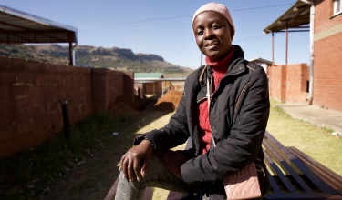 Lerato Mpholo smiling outside Botsabelo Hospital